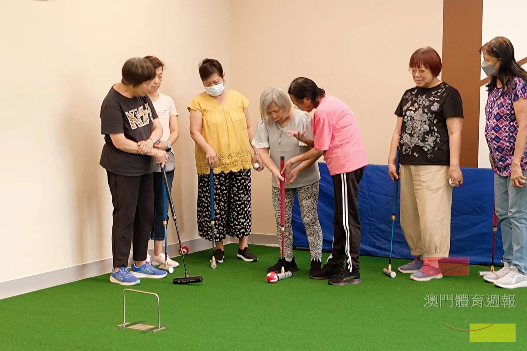 參與者體驗節奏溫和、兼具技巧與趣味的門球運動.jpg